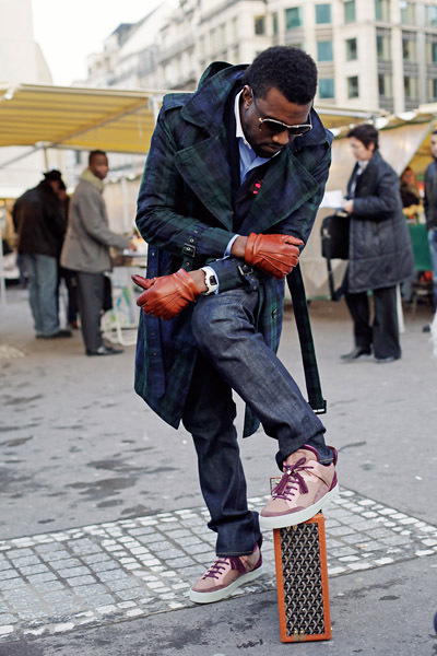 At Fashion Week in Milan 09: Let me higher elavate his ego:..great coat and jeans!